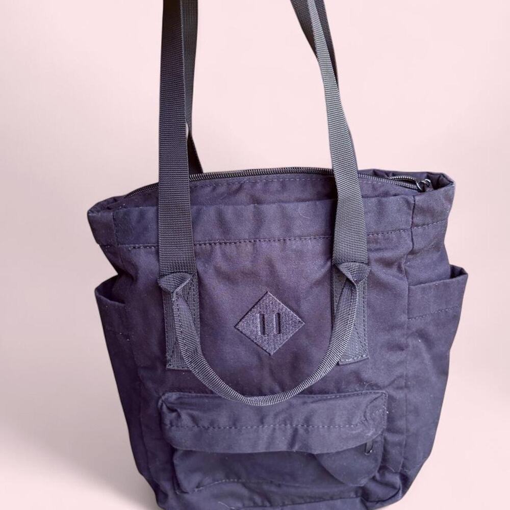 Black nylon utility tote bag with dual top handles Gorpcore techwear